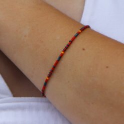 Red, yellow and blue bracelet made with Miyuki glass seed beads.