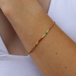 Red, green and gold bracelet made with Miyuki glass seed beads.