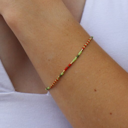 Red, green and gold bracelet made with Miyuki glass seed beads.