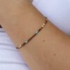 Brown, tan, cream and aqua bracelet made with Miyuki glass seed beads.