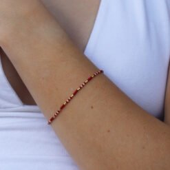 Red, beige and silver bracelet made with Miyuki glass seed beads.